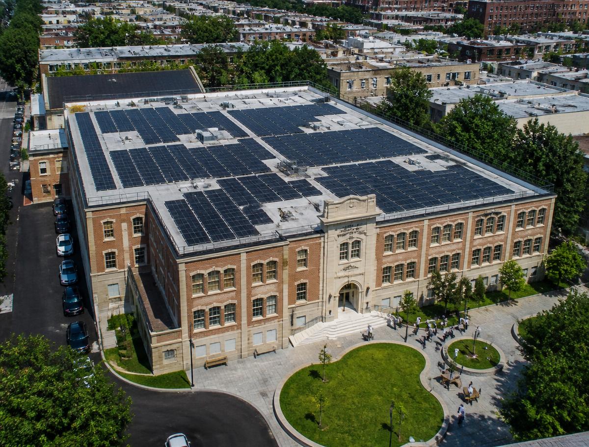 Yeshiva school building with a full rooftop solar array